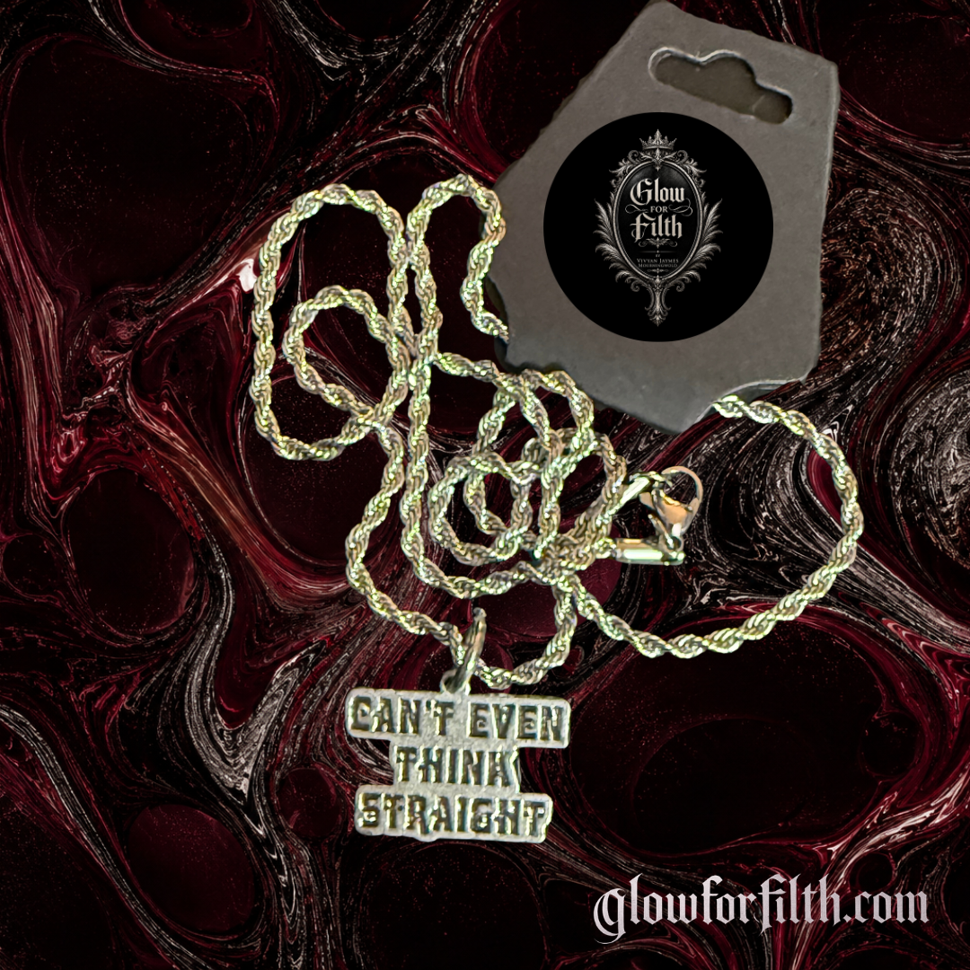 Silver-tone rope chain necklace featuring a "Can't Even Think Straight" statement pendant displayed on a gothic burgundy and black marbled background.