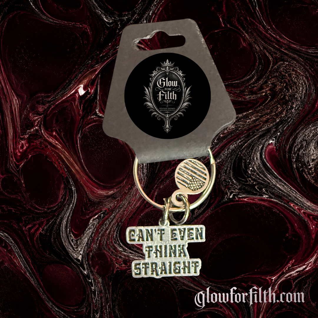 Silver-tone keychain featuring a "Can't Even Think Straight" charm and decorative accent displayed on a gothic burgundy and black background.